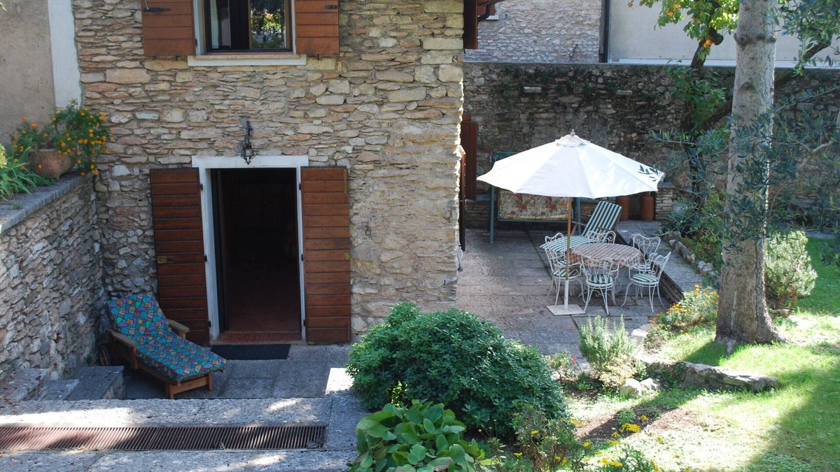 Cecina Apartment | Rustico Cecina by Theater Home, with big closed garden