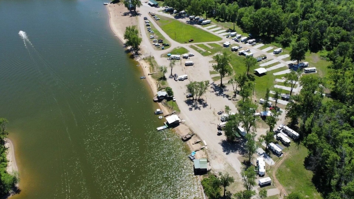 Saint Mary Of The Woods RV Rental | RV on a lake in a campground. Great for parties