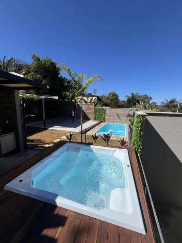 Confins House | Sítio em confins, com Piscina e hidro aquecida