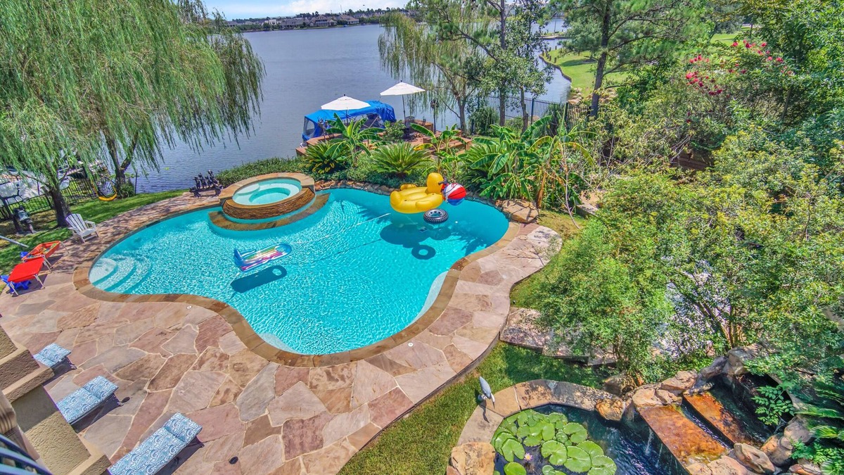 Panther Creek House | Sail to Hughes Landing, Waterway, or Pavilion. Heated Pool, Jacuzzi, & Cinema