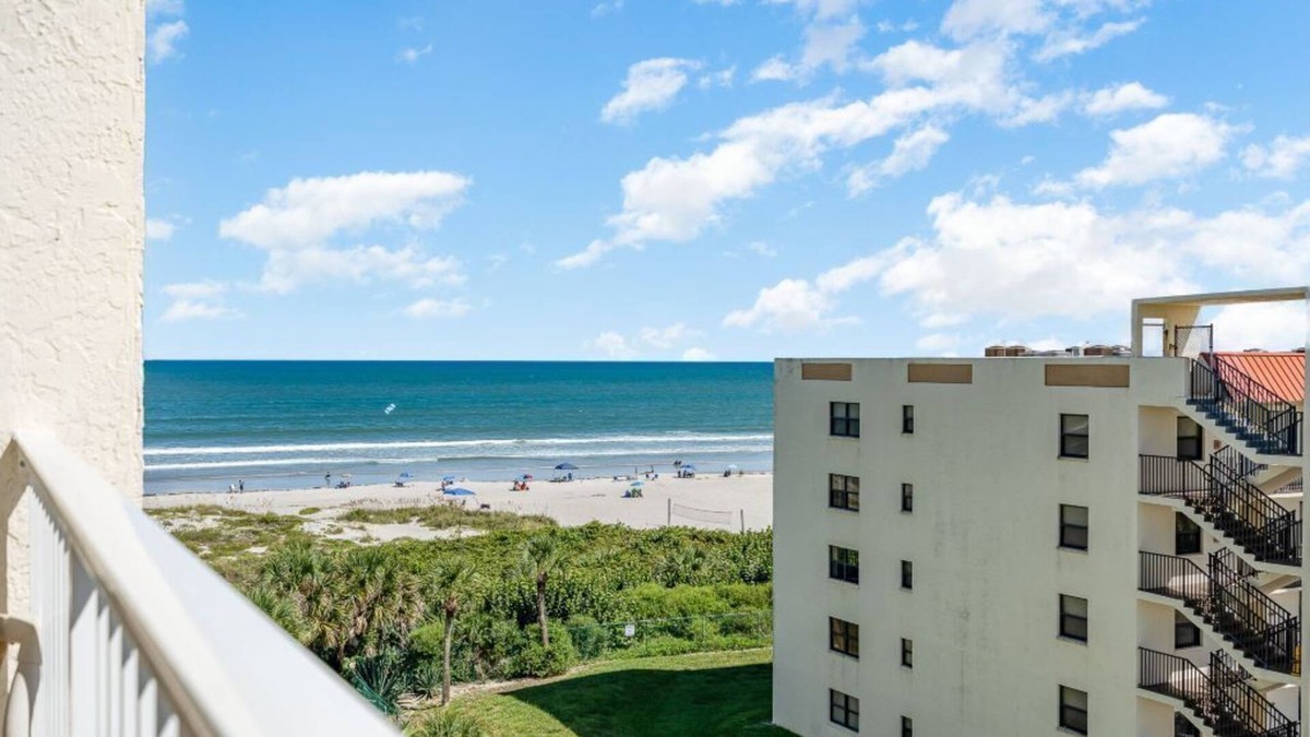 Cocoa Beach Condo | Sandcastles condo 614, great side ocean view and fantastic reviews