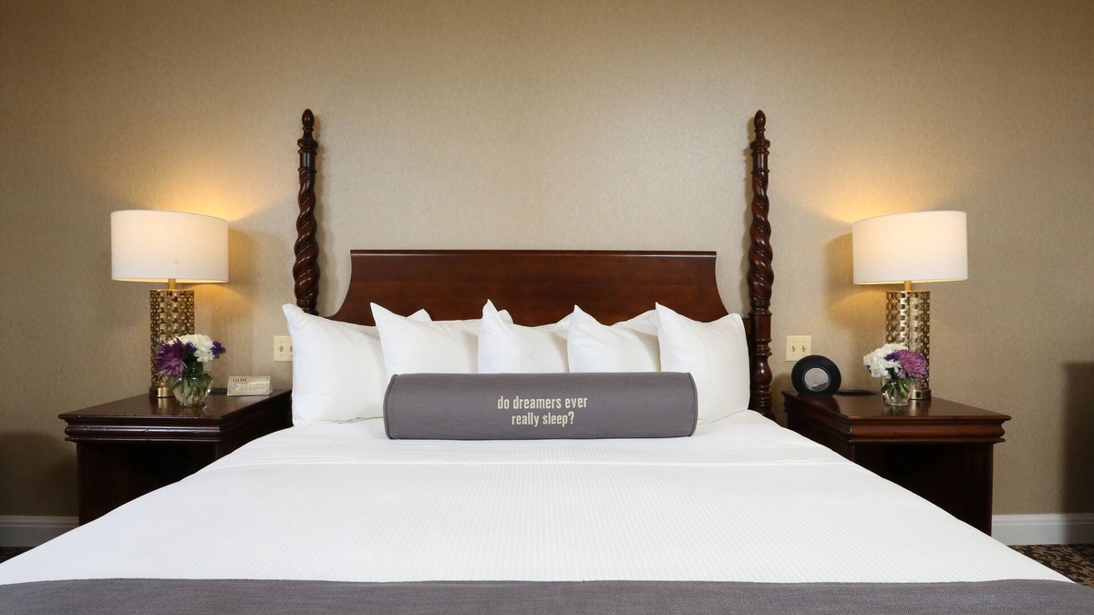 Rochester Hotel | Savor the European Charm of Our Elegant Stay! Pet-Friendly Options & Bar