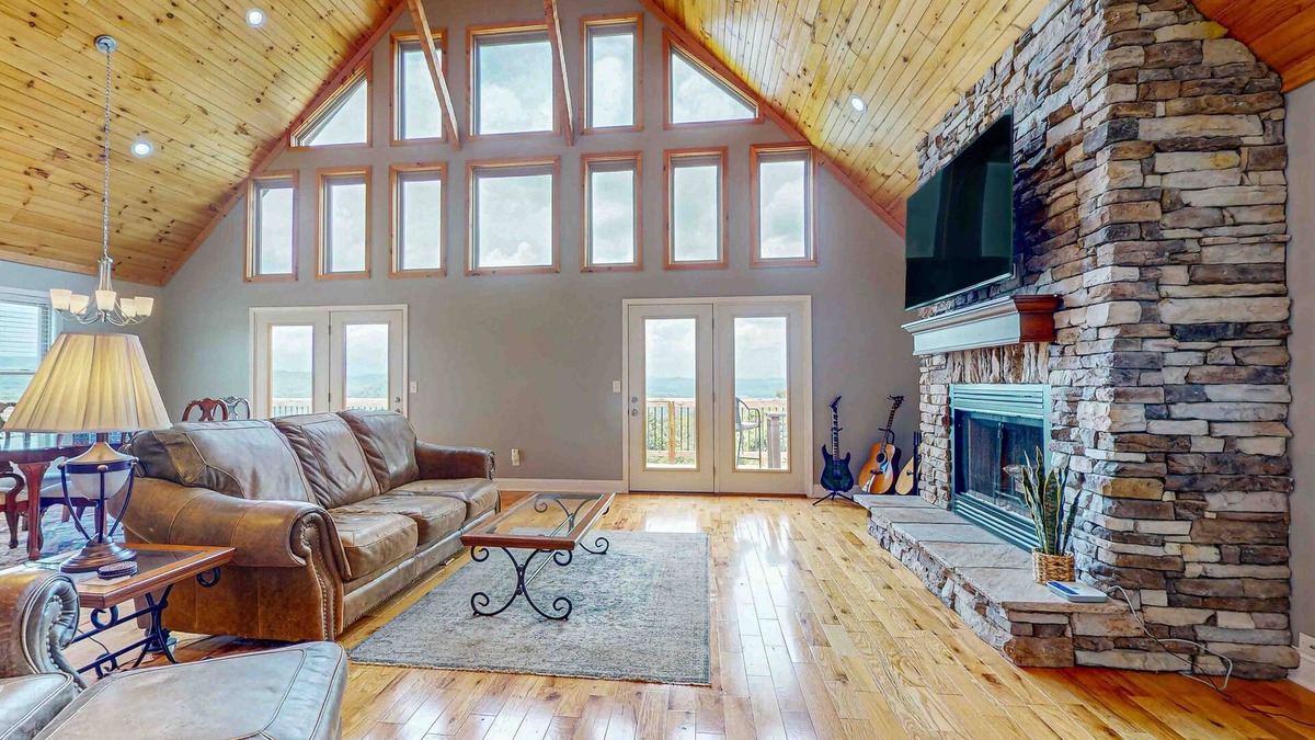 Maynardville House | Scenic lakeview retreat with wraparound deck, vaulted ceilings & game room