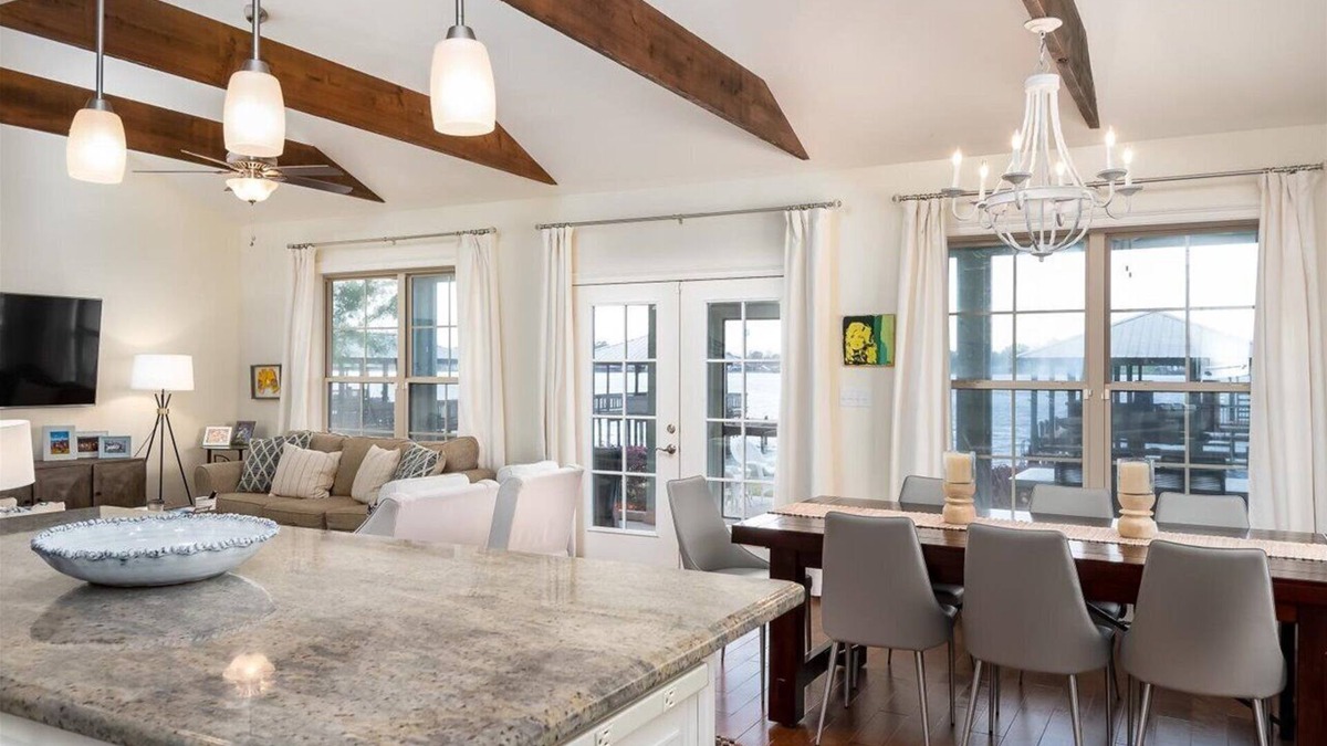 Ventress House | Screened porch and private pier on False River
