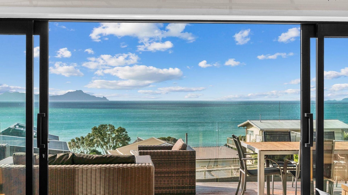 Langs Beach House | Sea Spray - Large modern, sunny holiday home with expansive decks and stunning views over Bream Bay