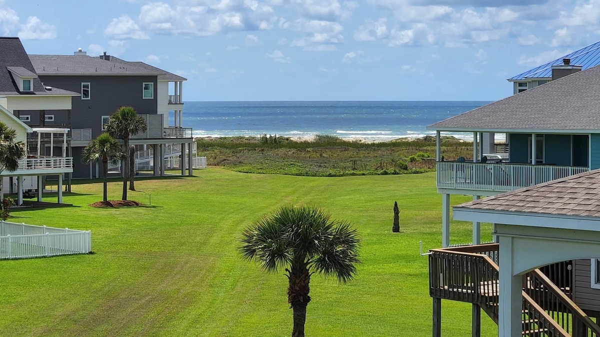 Pointe San Luis House | Sea Turtle Tango- Close to beach! Community Pool!