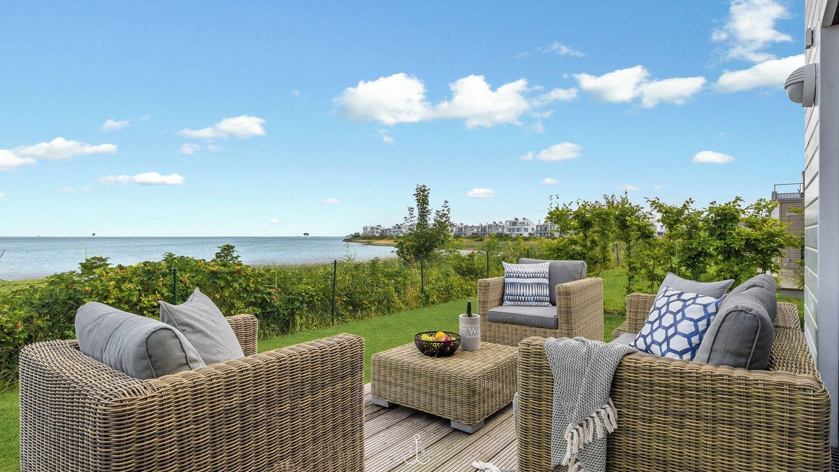 Olpenitz Apartment | Sea view - 1st row on the water, terrace, ground floor, sauna, bathtub, electric grill