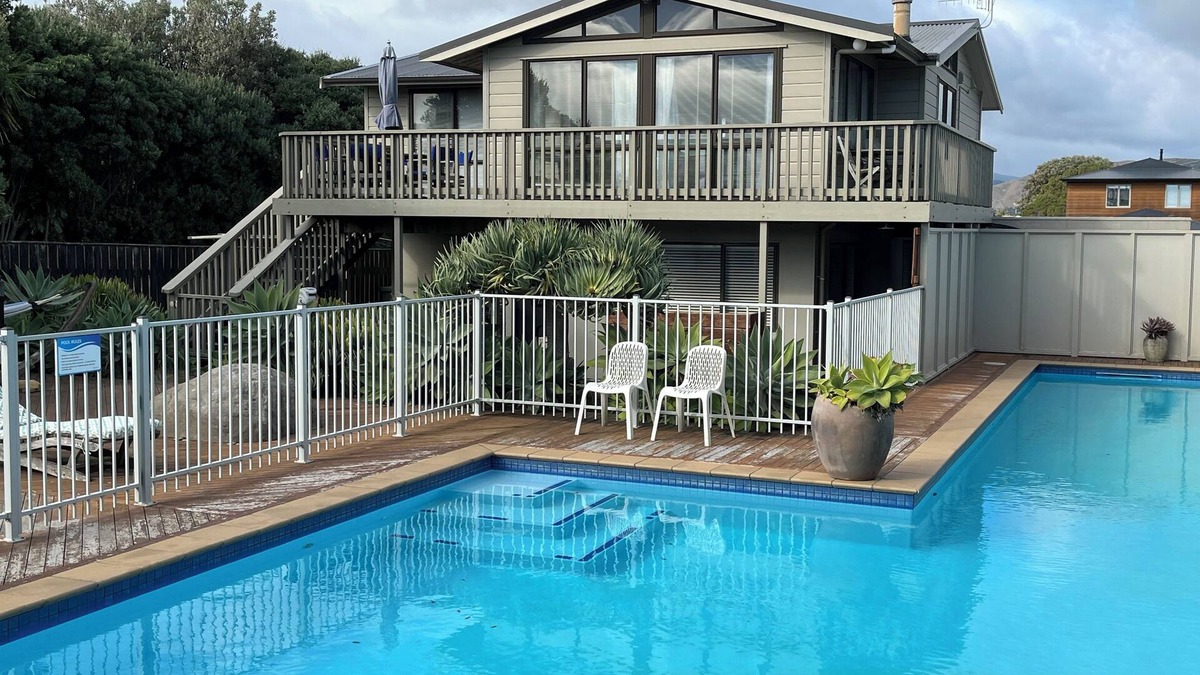 Waikanae House | SEABREEZE@Longshore: heated swimming pool, spa, tennis court, 2 minutes to beach