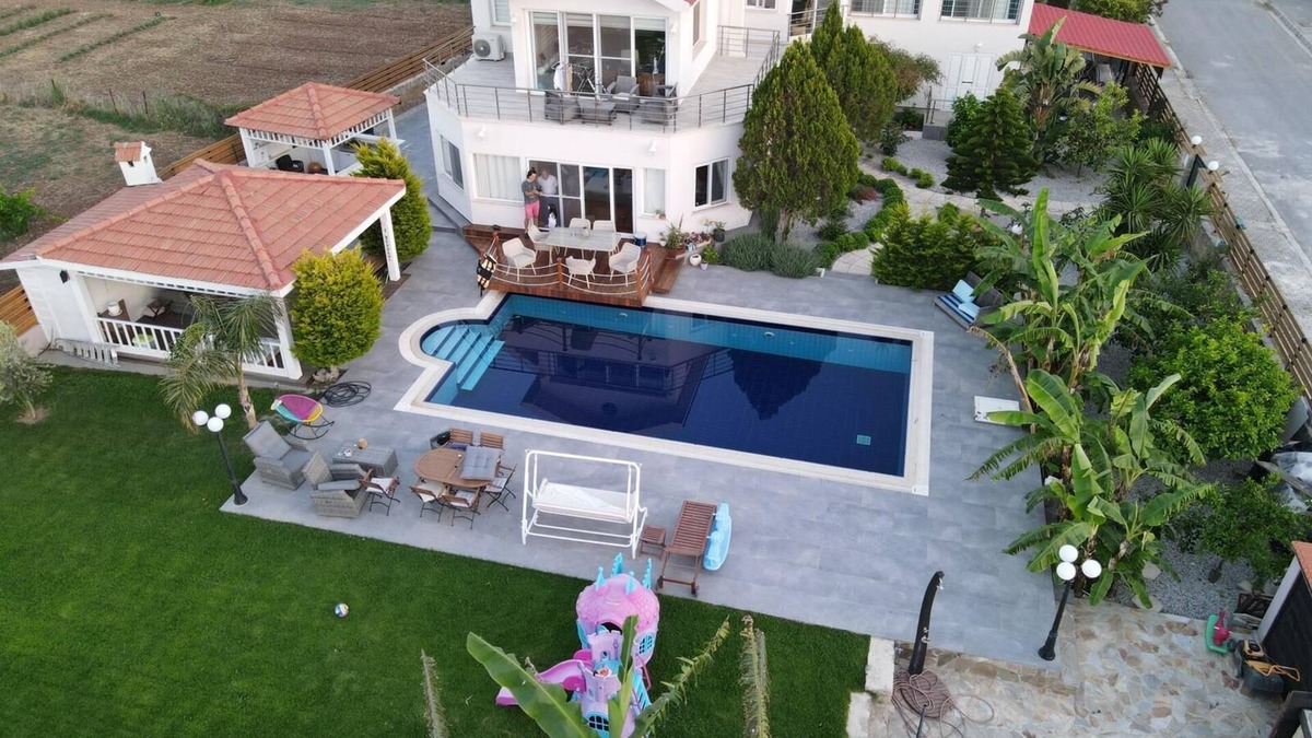 Catalkoy Villa | Seafront Villa with large swimming pool with sea and mountain views.