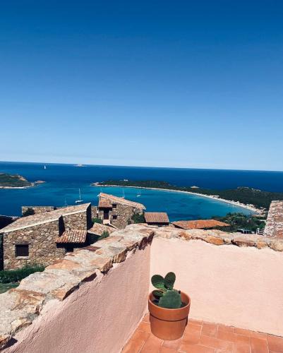 Capo Coda Cavallo Apartment | Seagarden Home vista mare con giardino privato