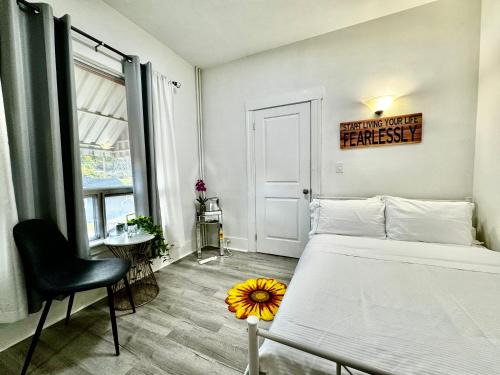 Rainier Valley House | Seattle Home with 2 bedrooms a King bed Queen bed and an Extra Sofa Bed Located 10 minutes from SeaTac Airport and 20 minutes from Downtown