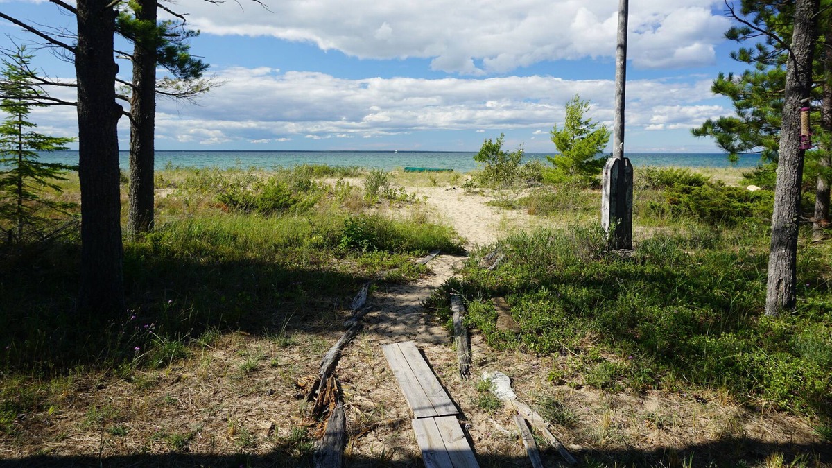 Cheboygan Cabin | Secluded Beach Front Log Cabin Next to Nature Preserve