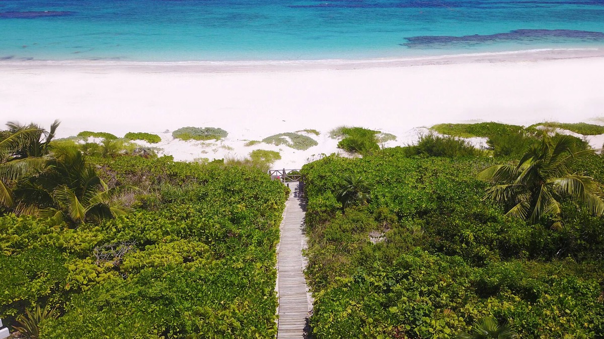 Dunmore Town House | Secluded beachfront property - private beach access, generator, sat. internet