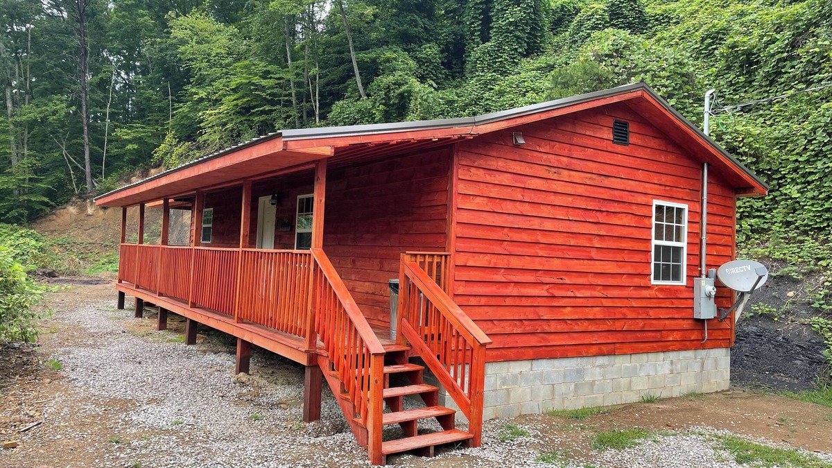 Lejunior Cabin | Secluded Cabin with a mountain view, hot tub, full kitchen, and living room.