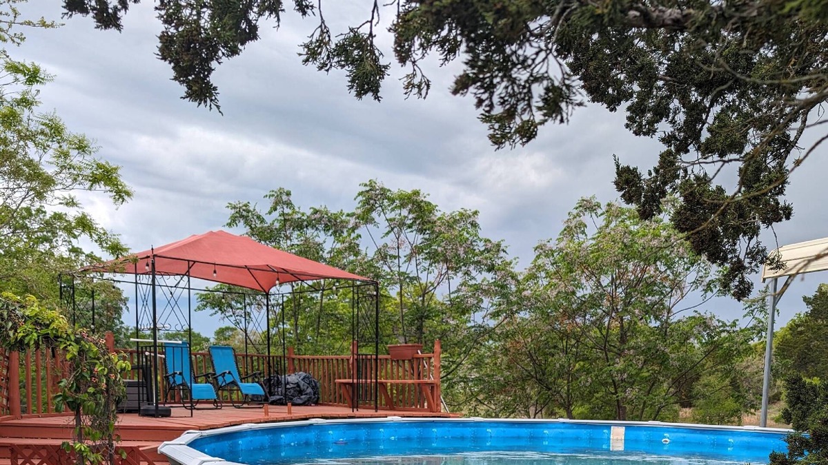 Cedar Creek House | Secluded Country Home on 15 Acres. Pool, BBQ, Hot Tub and Ping Pong. Close to COTA. RV Parking