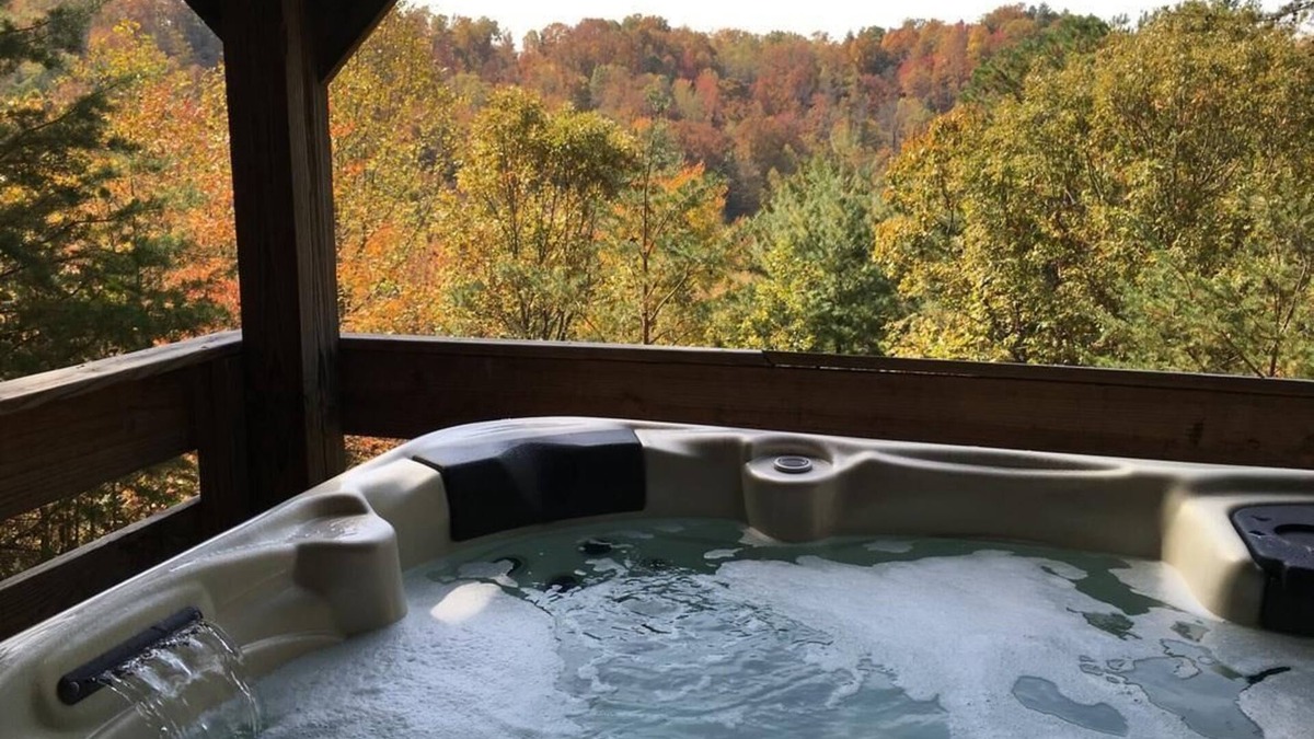 Primrose Cabin | Secluded, Great View! Hot Tub, Wood Fireplace, Screened in Porch, Arcade Games.