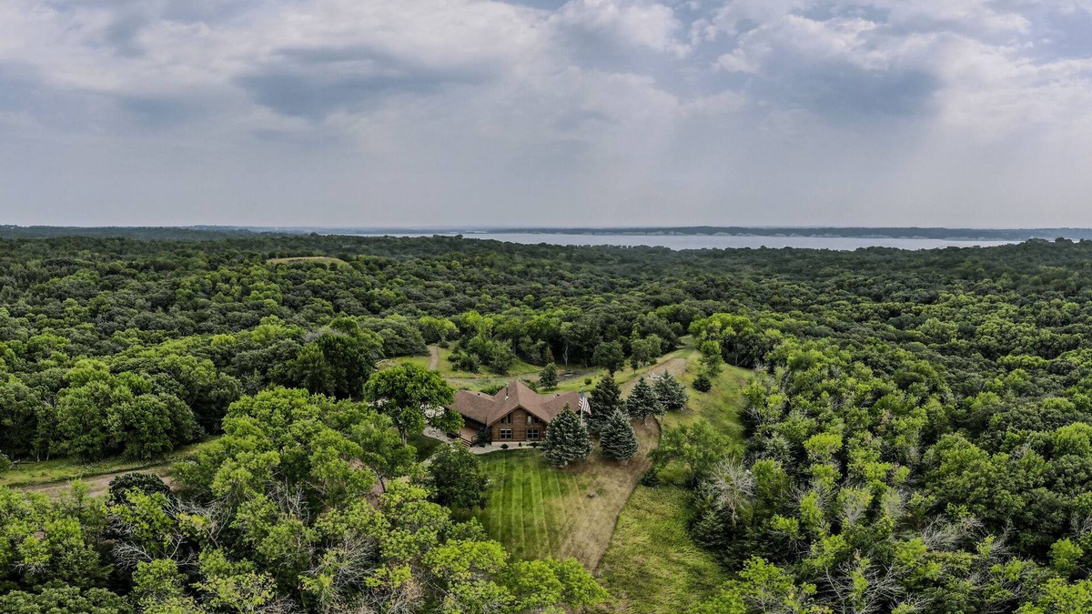 Yankton Cabin | Secluded Lake View Log Cabin on 40 Acres