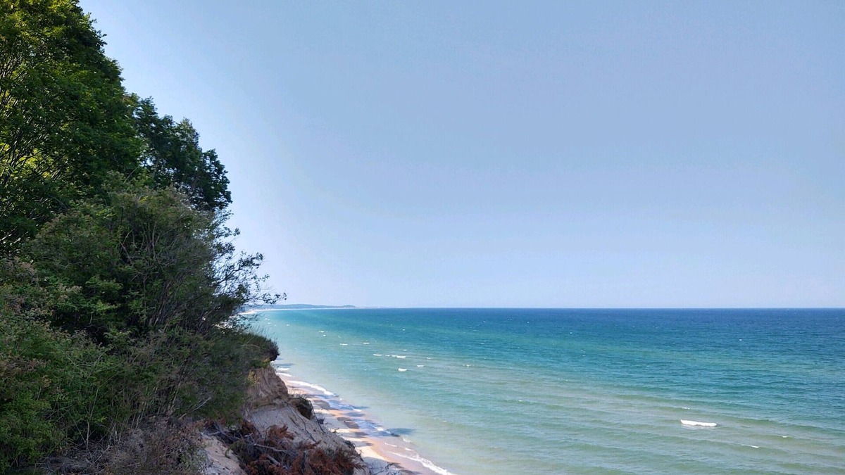 Manistee Cabin | Secluded log cabin in Manistee Nat'l Forest with access to Lake Michigan beach.