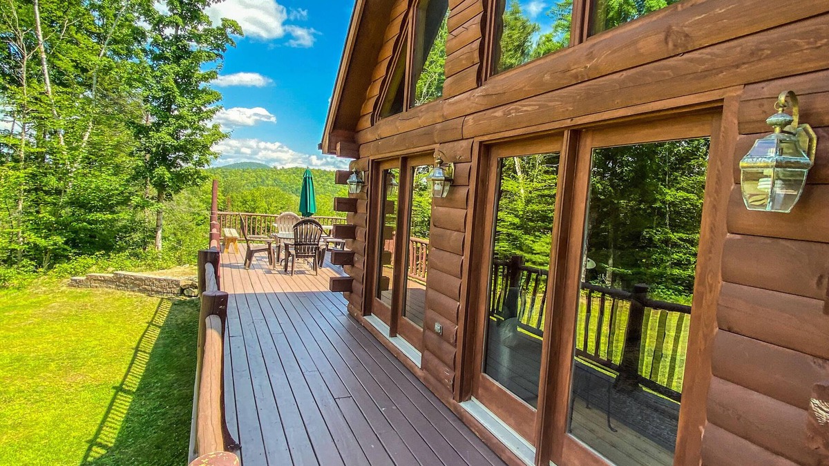Johnsburg House | Secluded Log Cabin with hot-tub. Near Lake George. Amazing Mt View. Sleeps 15