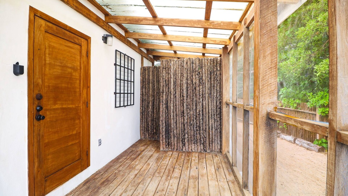 Dangriga Cabin | Secluded seaside cabana with beach access, ocean view, hammock & partial AC