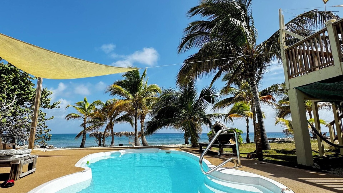 West End House | Secluded Sunsets 3400 Sq Ft Villa with 3 Separate Suites on the Ocean with Pool!