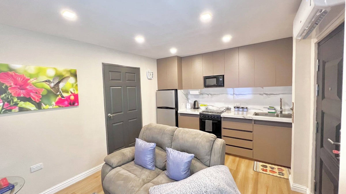 Diego Martin Apartment | Secure, Modern & Peaceful 1 bedroom apartment located in Diego Martin. Relax in a safe, stylish apartment with triple-lock doors, sound-insulated walls, and smart features. Enjoy stunning mountain views just minutes from Port of Spain.