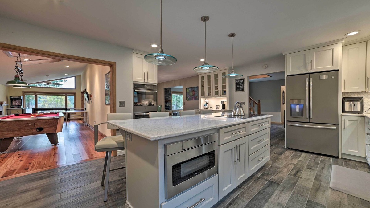 Rapid City House | Serene Riverfront Home w/Torch Lake Access!
