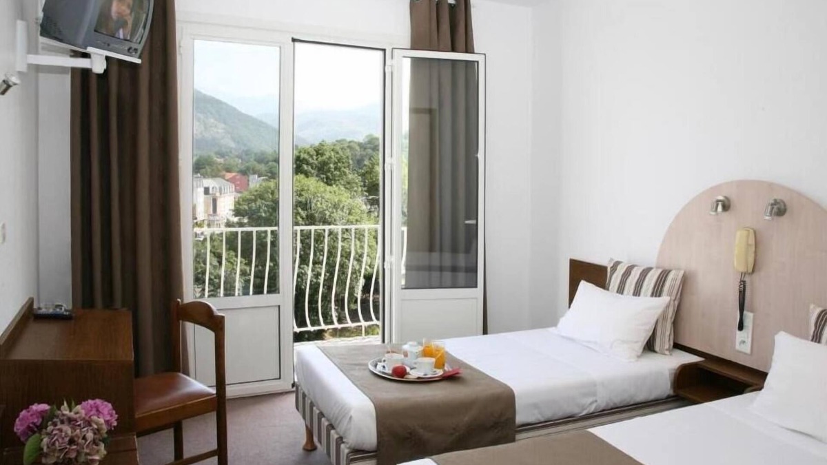 Lourdes Hotel | Serene & Spacious Unit with Balcony, Free Parking, Onsite Restaurant!