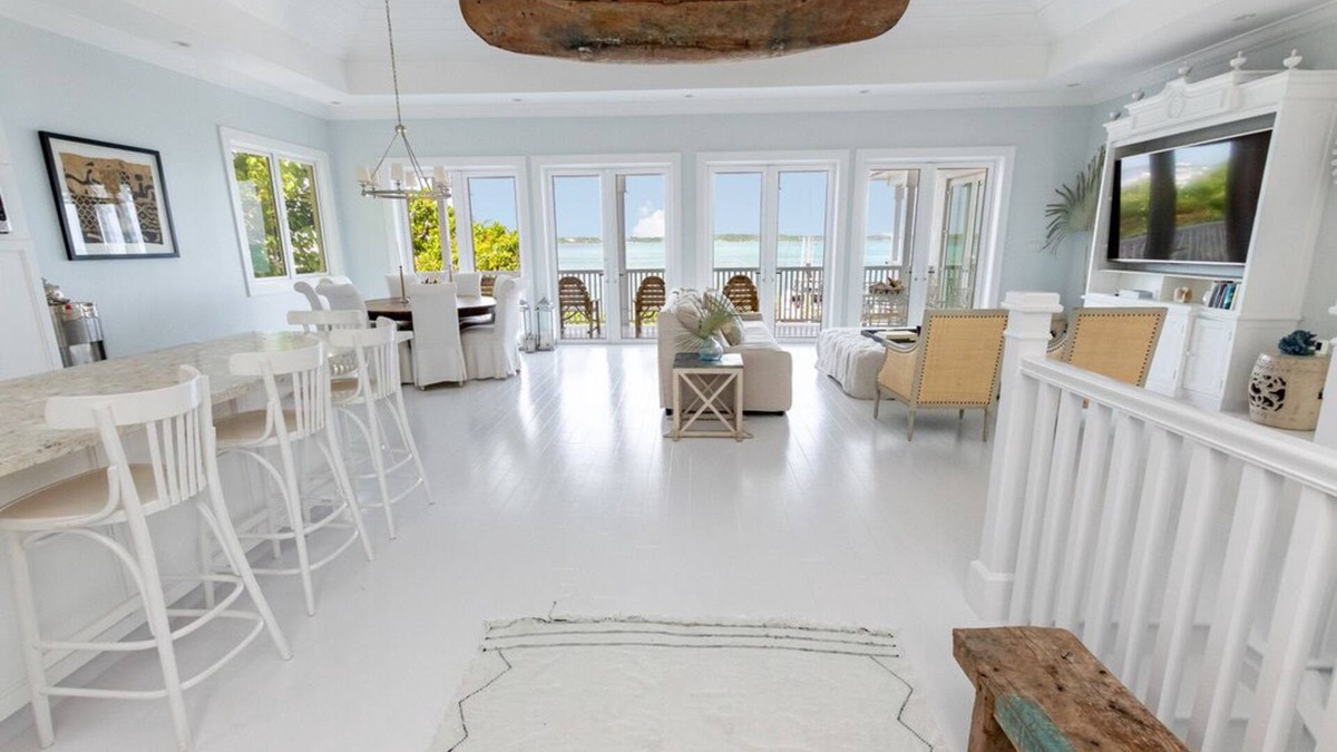 Dunmore Town House | Serene waterfront house w pool, dock & beautiful sunsets - 5 min walk to beach.