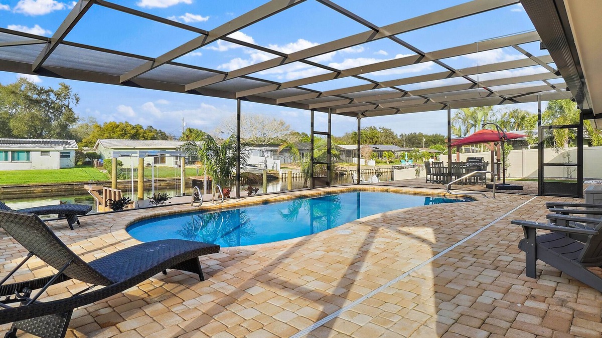 Riviera Bay House | Serenity by the Bay Waterfront HEATED POOL is an option. BOAT LIFT WITH KAYAK