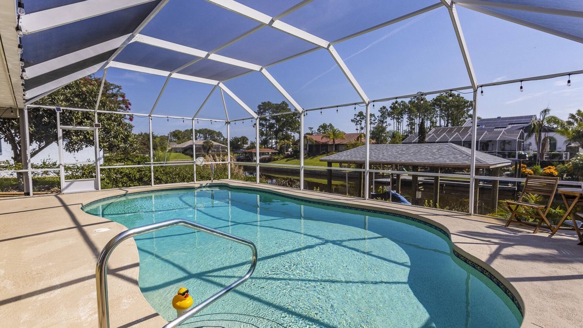 Palm Harbor House | Serenity Waterfront 4BR w/Private Dock, Heated Pool & Relaxing Hot Tub