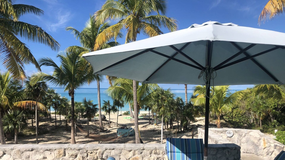 Bennett's Harbour House | Shangri-La- beach front views of crystal-clear blue waters and surreal sunsets.