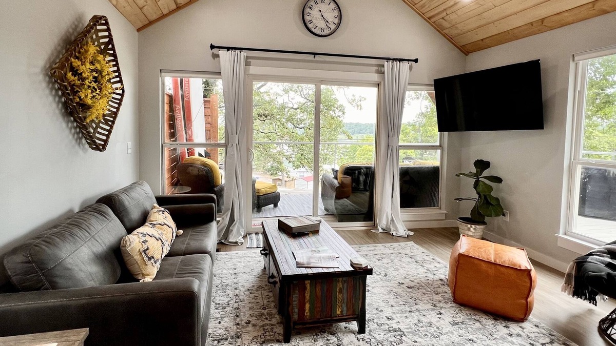 Cookson Cabin | SHORT WALK TO WATER & NESTLED IN THE TREES THIS BEAUTIFUL CABIN HAS LAKE VIEWS
