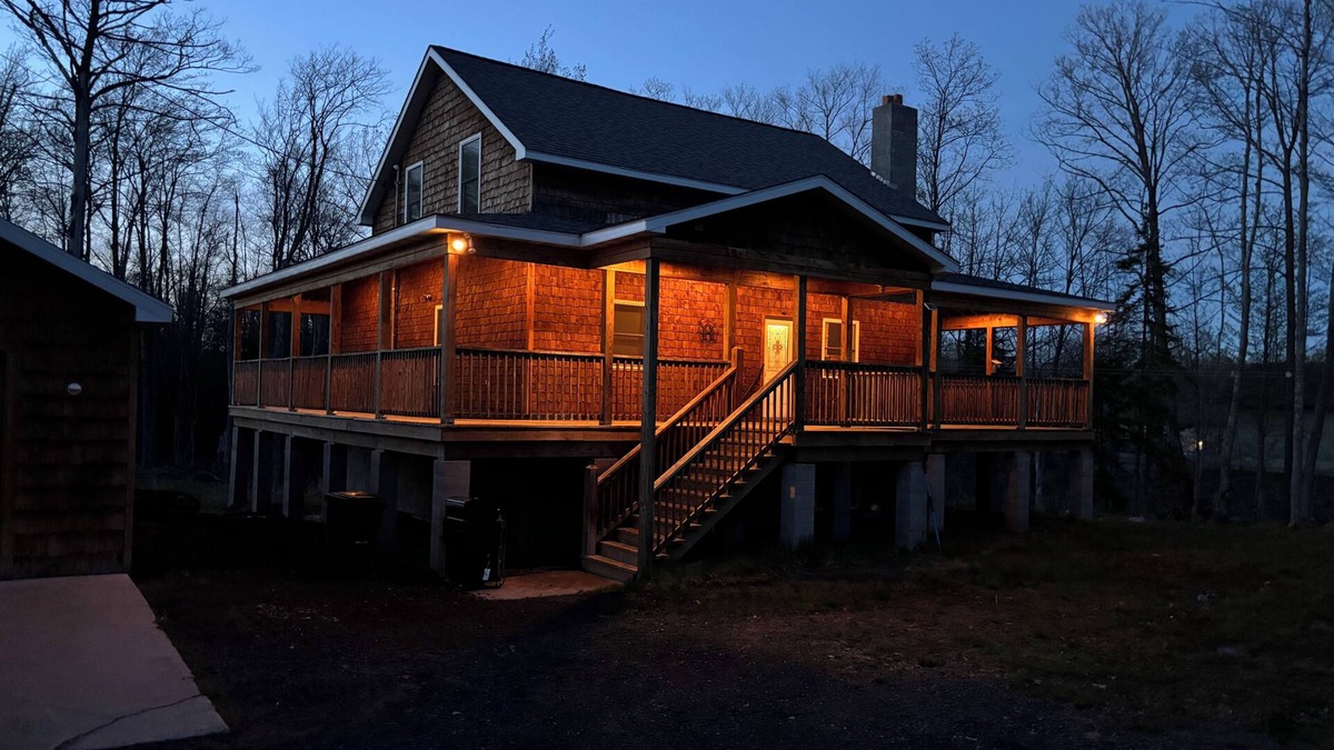 Trowbridge Park House | Six bedroom home with a hot tub, pool and an outdoor bar on a two acre lot.