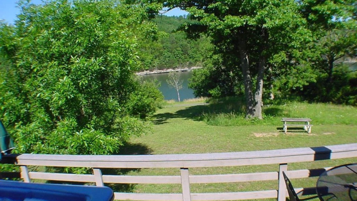 Holiday Island Condo | Six-Person Hot Tub, Lakeside, King Beds, Fireplace!