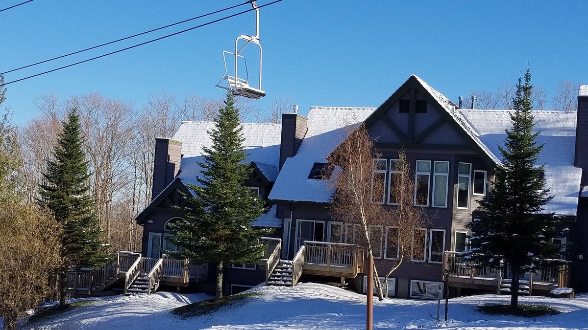 North Troy House | Ski in/out 4 BR townhome directly on Raccoon Run and the Village Chair Lift !
