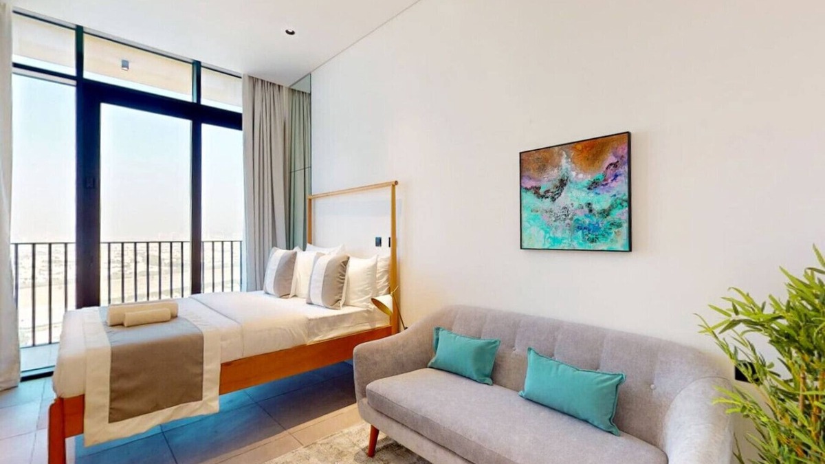 Jumeirah Village Triangle Apartment | Skyline Views: Sunset Studio with Balcony