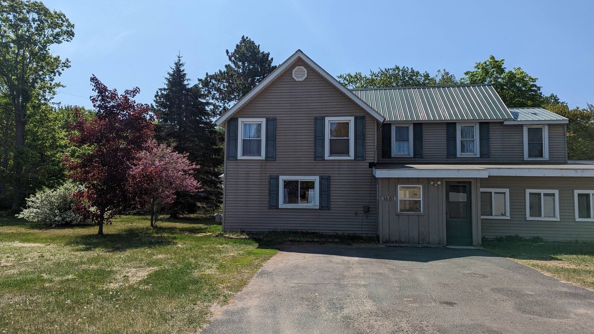 Upper Peninsula Michigan House | Sledders paradise. Home located across the street from riding trails.