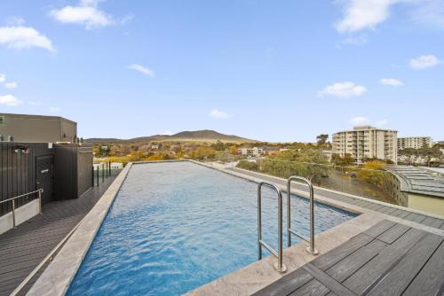 Dickson Apartment | Sleek Inner-City 2-Bed with Swimming Pool & BBQ