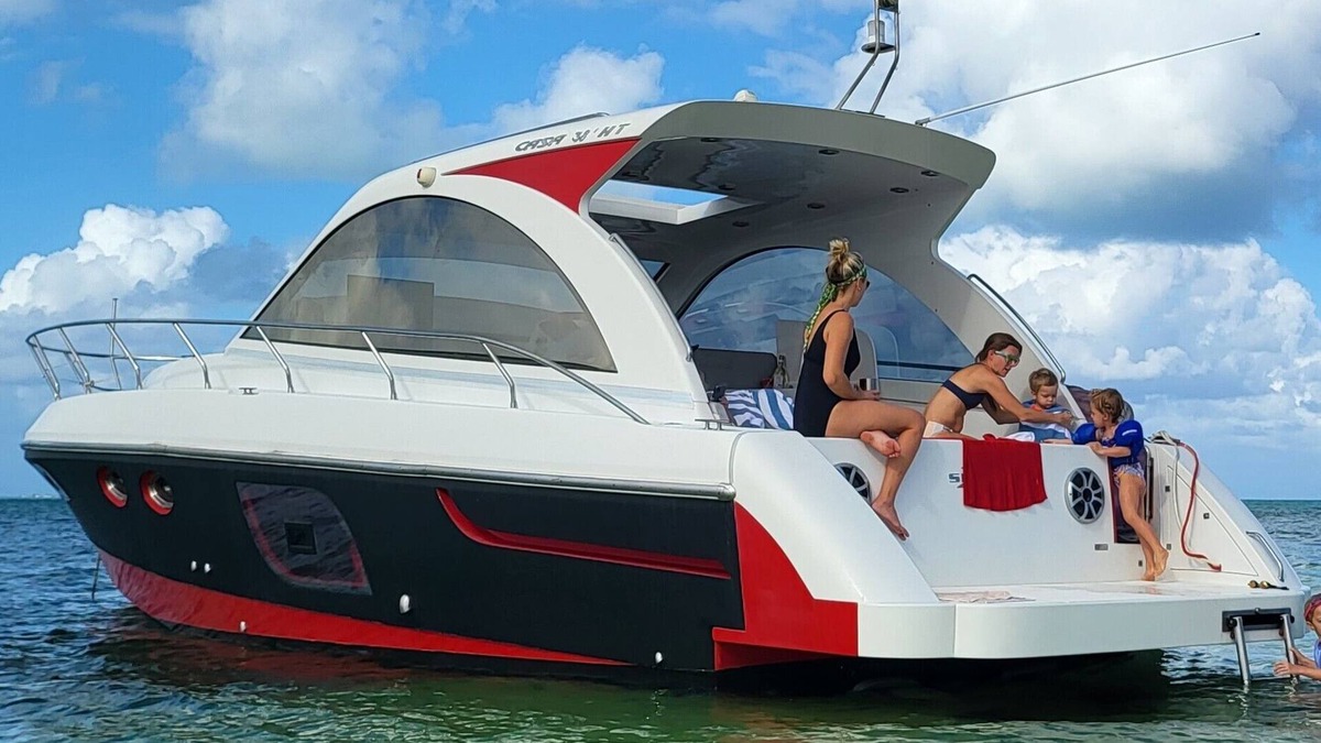 Seven Mile Beach Boat Rental | Sleep on a Sleek Italian Yacht in the Cayman Islands