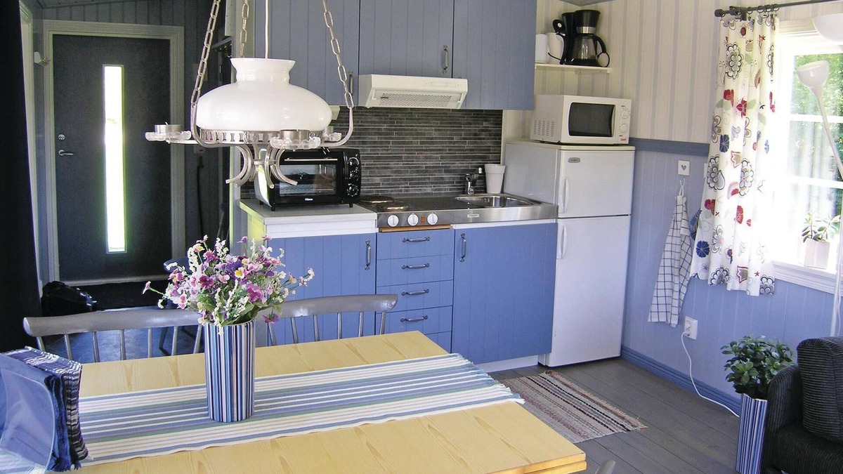 Sjotofta House | Small, well used cottage with terrace at the back.