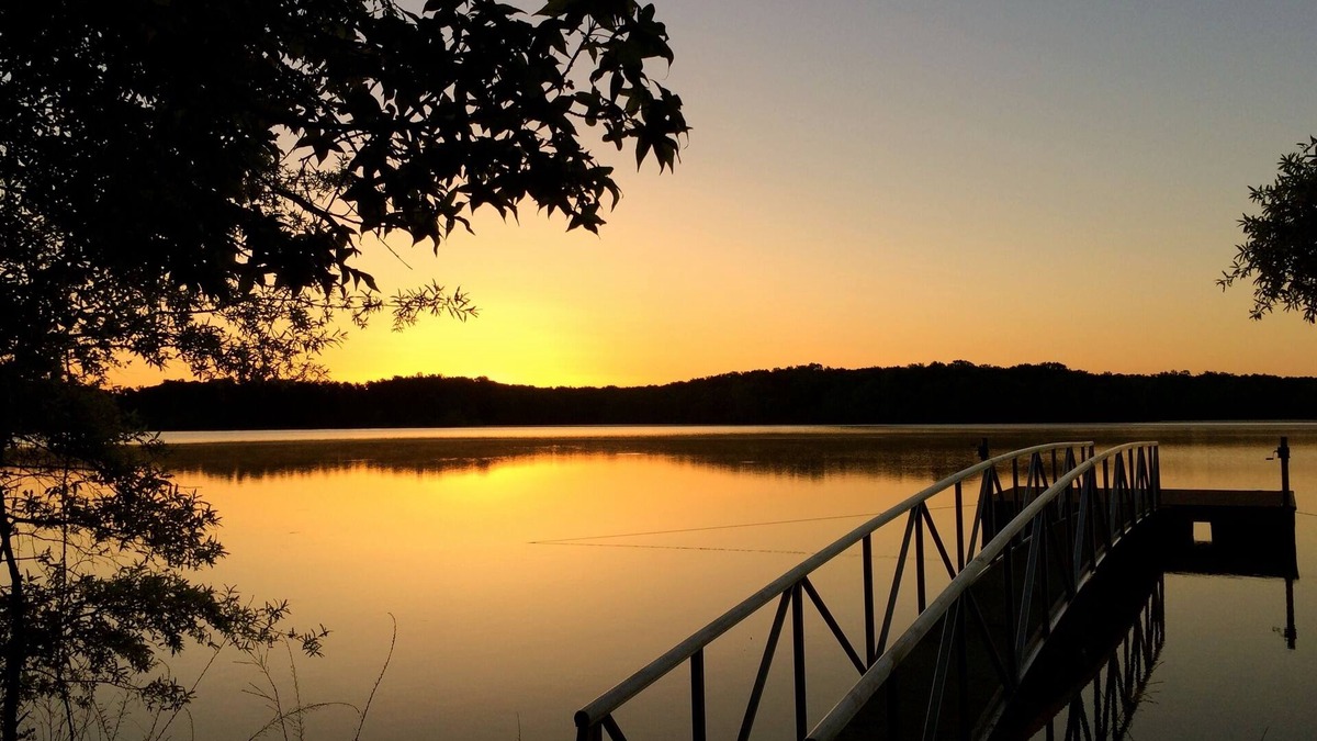 Clarksville Cottage | Solar powered cottage at lake, with dock, on private 300 acre timber preserve