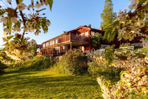 Tallberg House | Soltägtgården