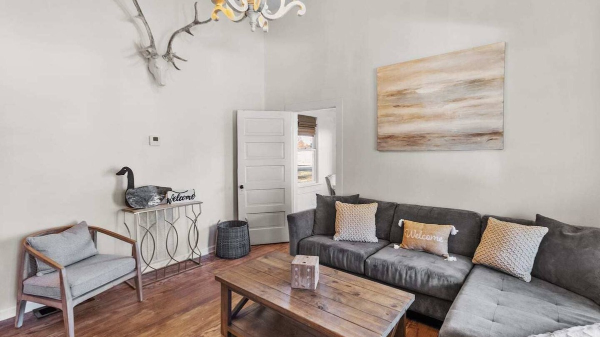 Mooringsport House | Southern Magnolia House with porch swing and rocking chairs