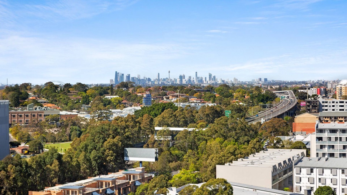 Homebush Apartment | Spacious 2-Bed: Rooftop Views, Near Olympic Park