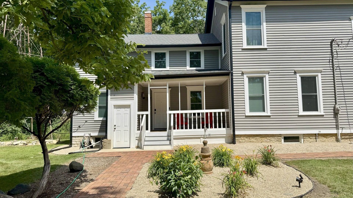 Oswego Other | Spacious 5-bedroom farmhouse in charming Oswego with private woods