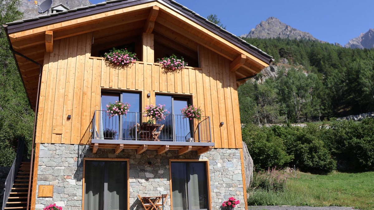 Bionaz Apartment | Spacious and bright studio apartment with large windows and a beautiful view of the mountains.