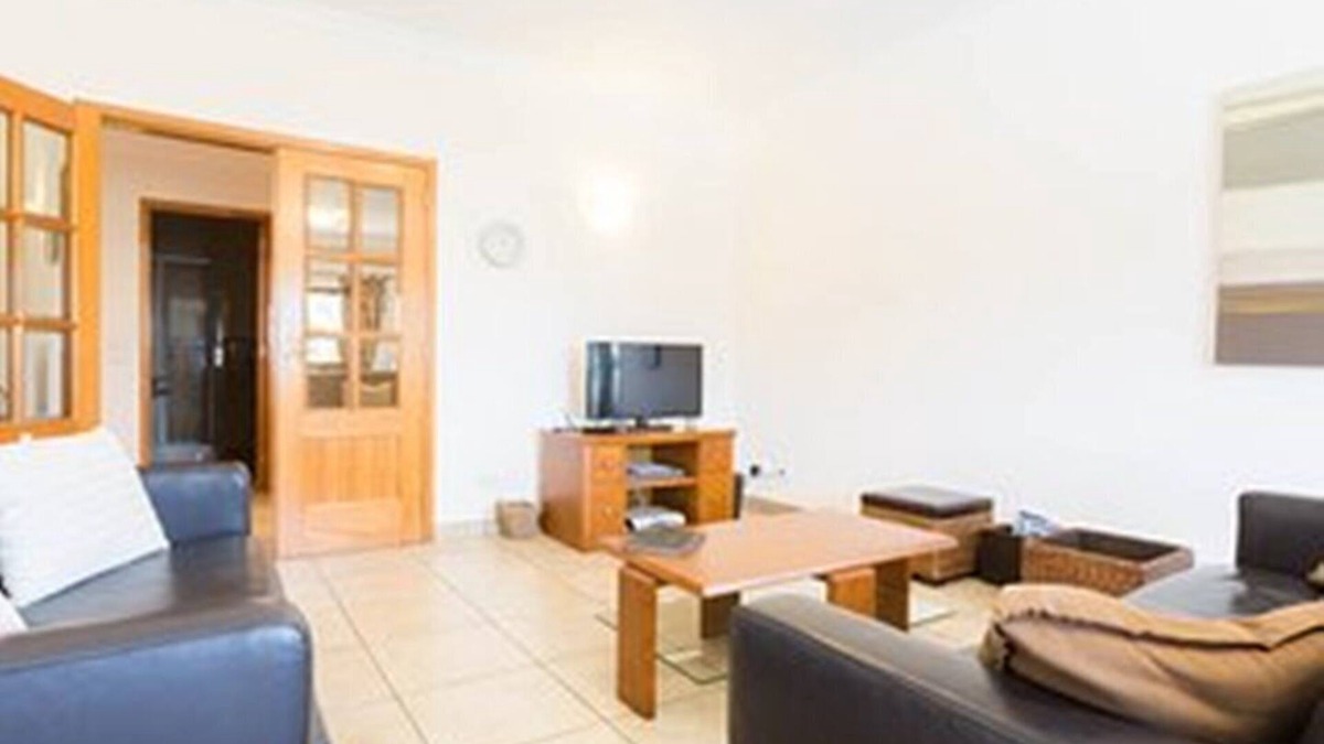Albardeira Apartment | Spacious Apartment With Shared Pool And Sea Views