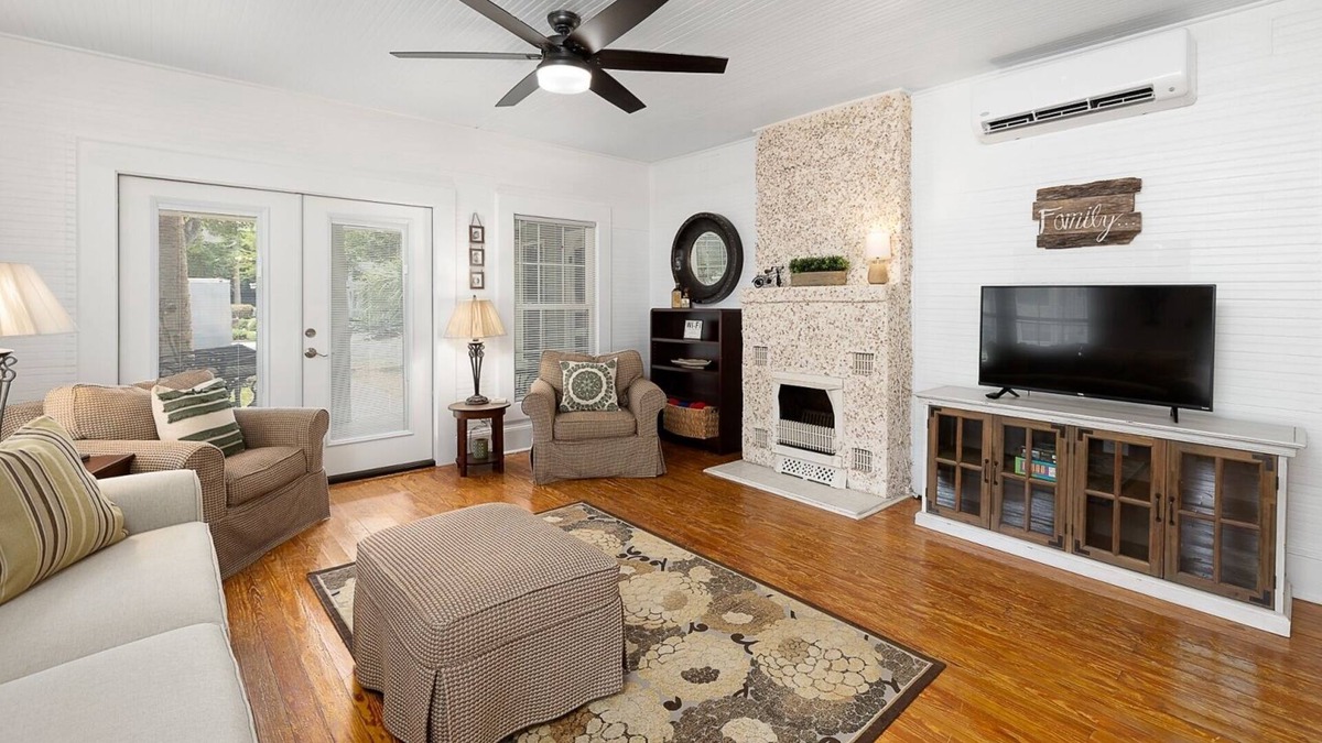 Saint Simons Island Cottage | Spacious Cottage-Wraparound Deck! One short block to beach-Walk to Pier Village!
