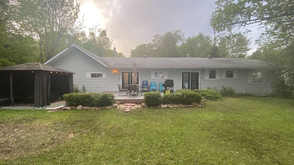 Algoma District Cottage | Spacious Cottage On Lake with Beach, Fire Pit, Kayaks, Pedal Boat & More!